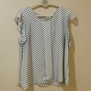 White and black polka dot professional top.